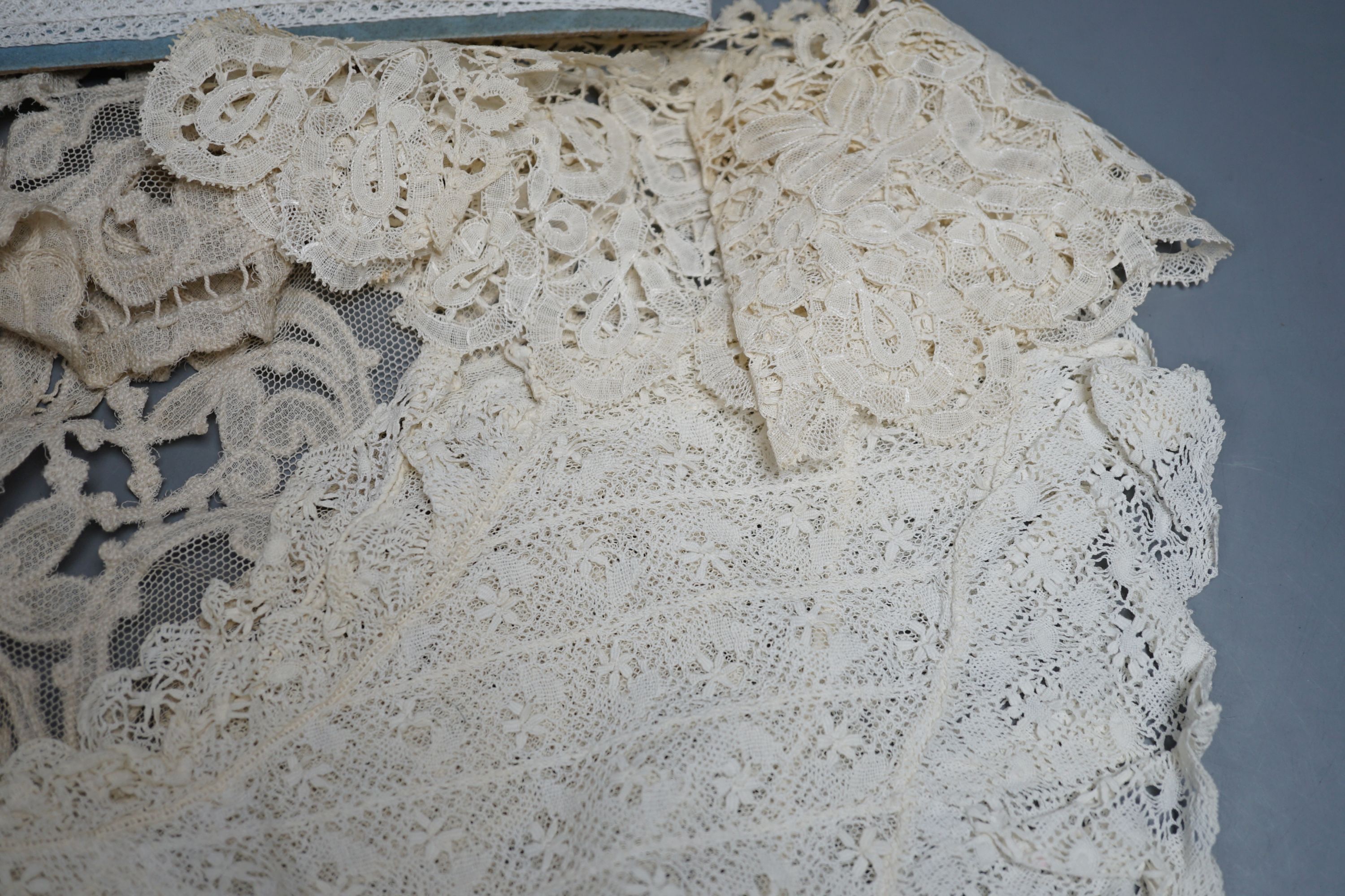 A lace bolero, a small collection of lace collars, trimmings etc